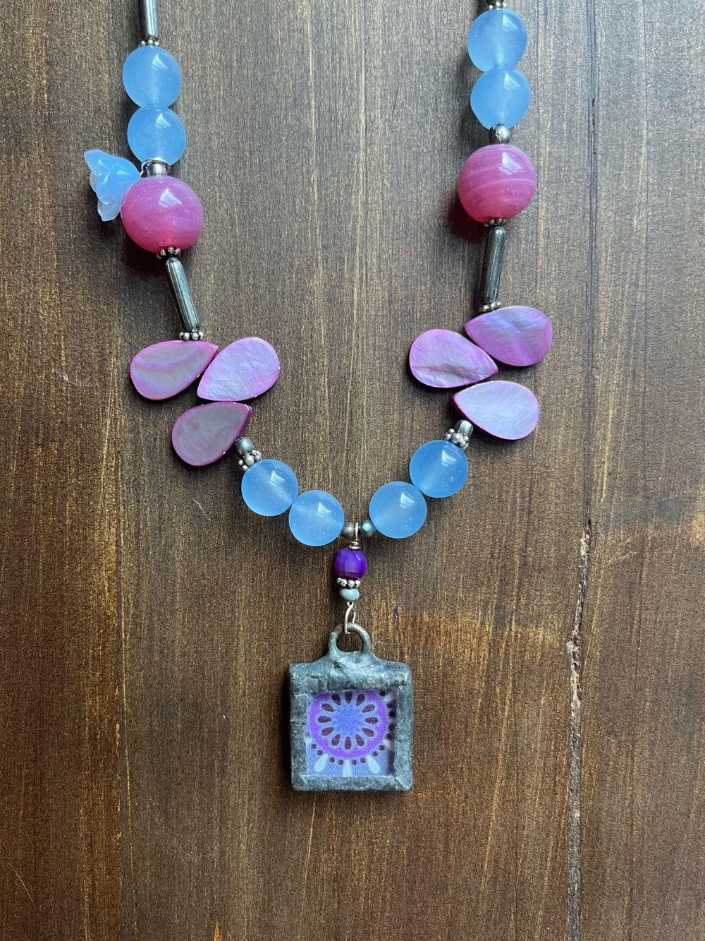 Handcrafted pendant with lavender mother of pearl beads